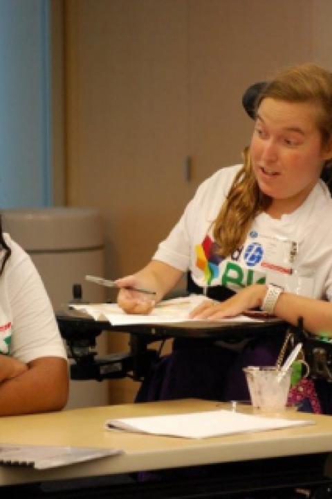 Sarah-Schwegel-right-working-with-a-camper-at-the-DREAM-BIG-camp.jpeg