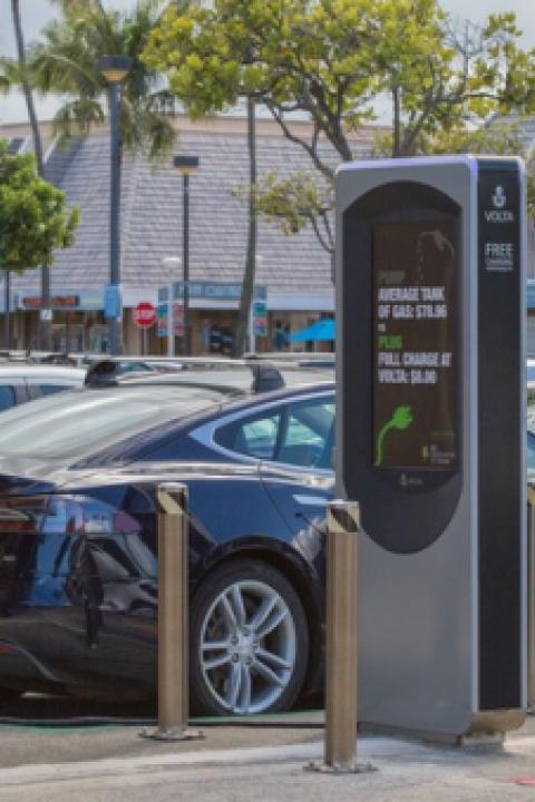 Volta-person-charging-EV.jpg