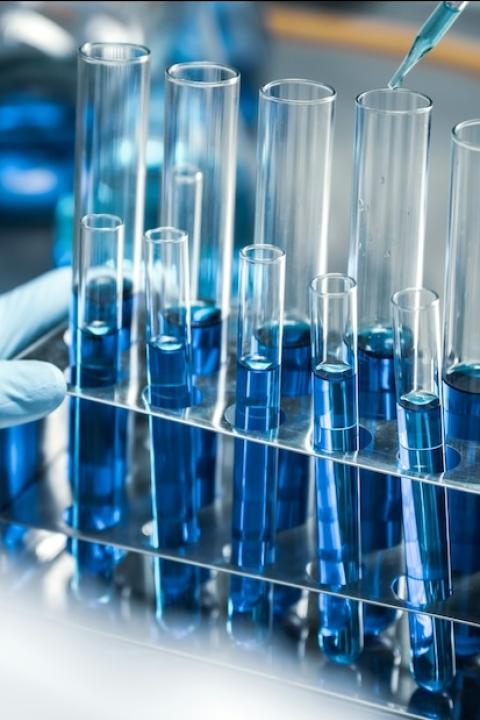 chemistry - in a lab with beakers - green chemistry