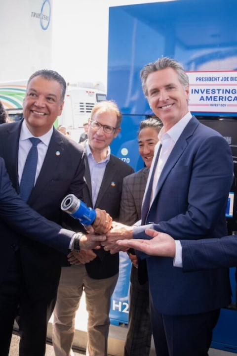 State and national leaders stand together near a hydrogen fuel station in Oakland, California — clean hydrogen