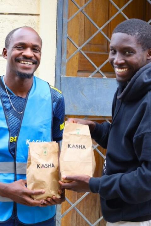 A Kasha employee delivering medicines to customers — healthcare access