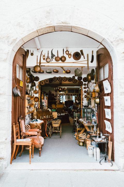 kitchenware and furniture for sale at a thrift shop - shop secondhand