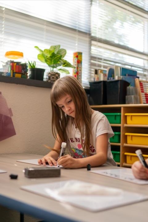 students in a classoom - Subaru and AdoptAClassroom