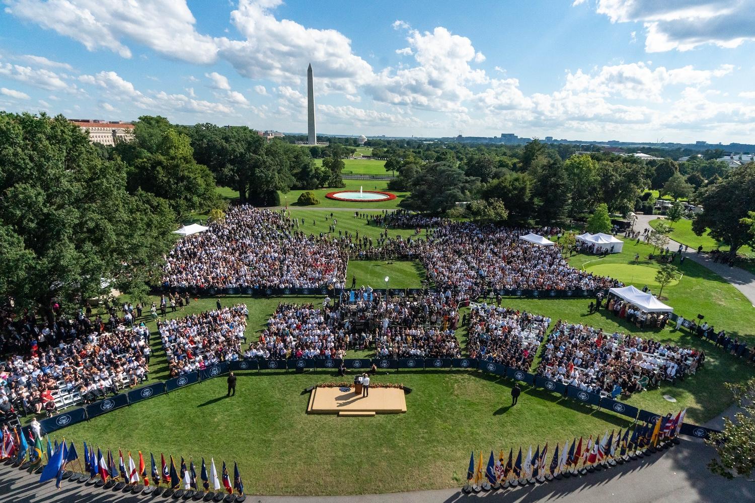 Inflation Reduction Act Passage 2022 - crowd gathers in front of the washington monument