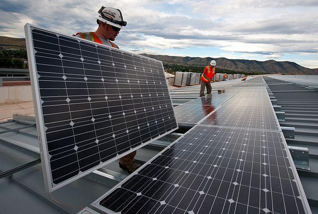 Installing_Solar_Panels_7336033672.jpg