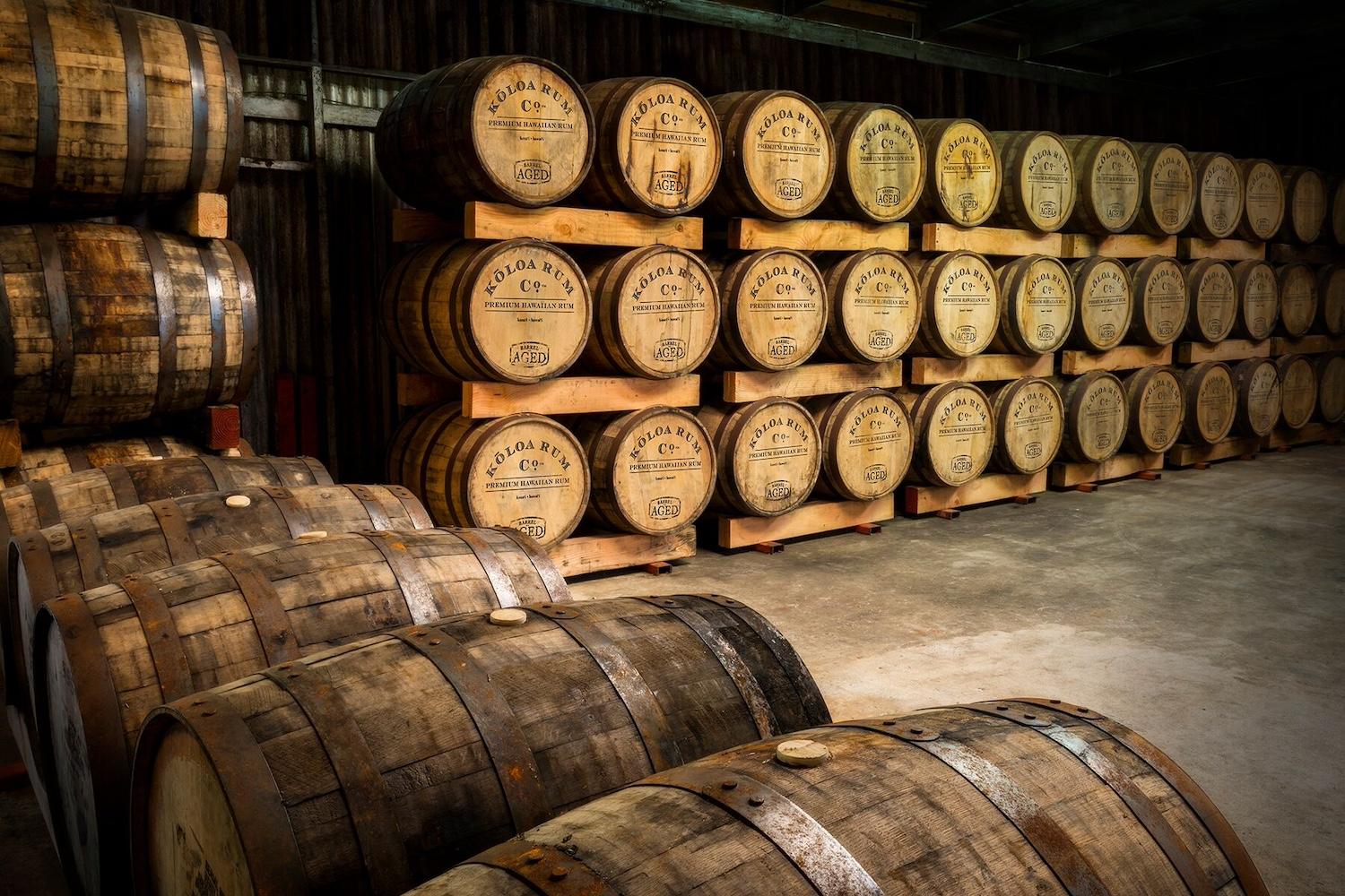 A wall of Kōloa Rum barrels — sustainable rum