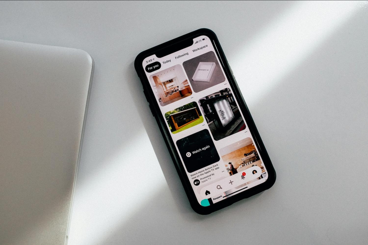 A phone displaying the Pinterest app — RECs