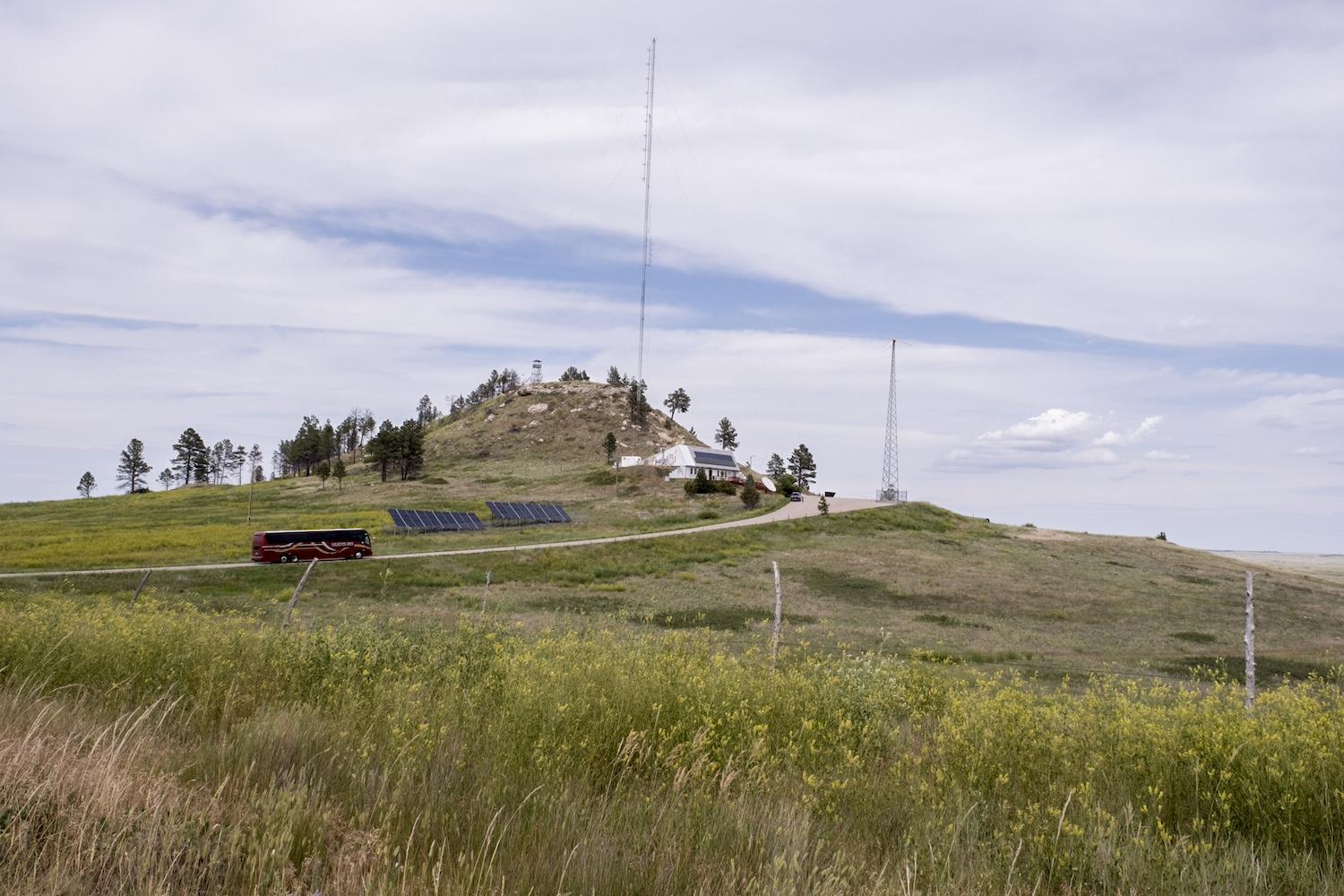 A solar array on a hill on the Pine Ridge Reservation in present-day South Dakota — Red Cloud Renewable