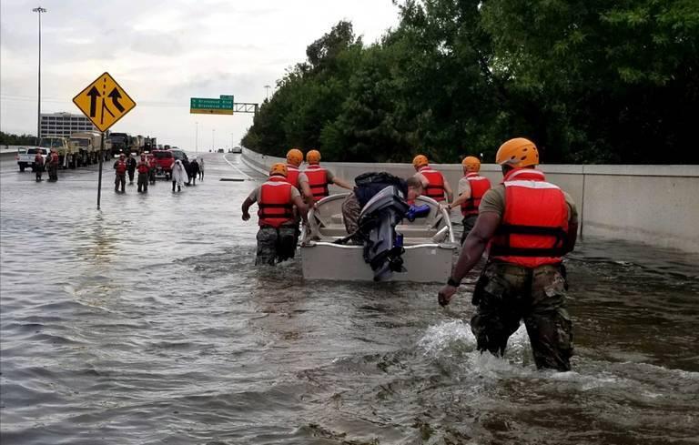 Texas-Army-National-Guard-soldiers-move-through-flooded-Houston-streets-on-August-28.jpg