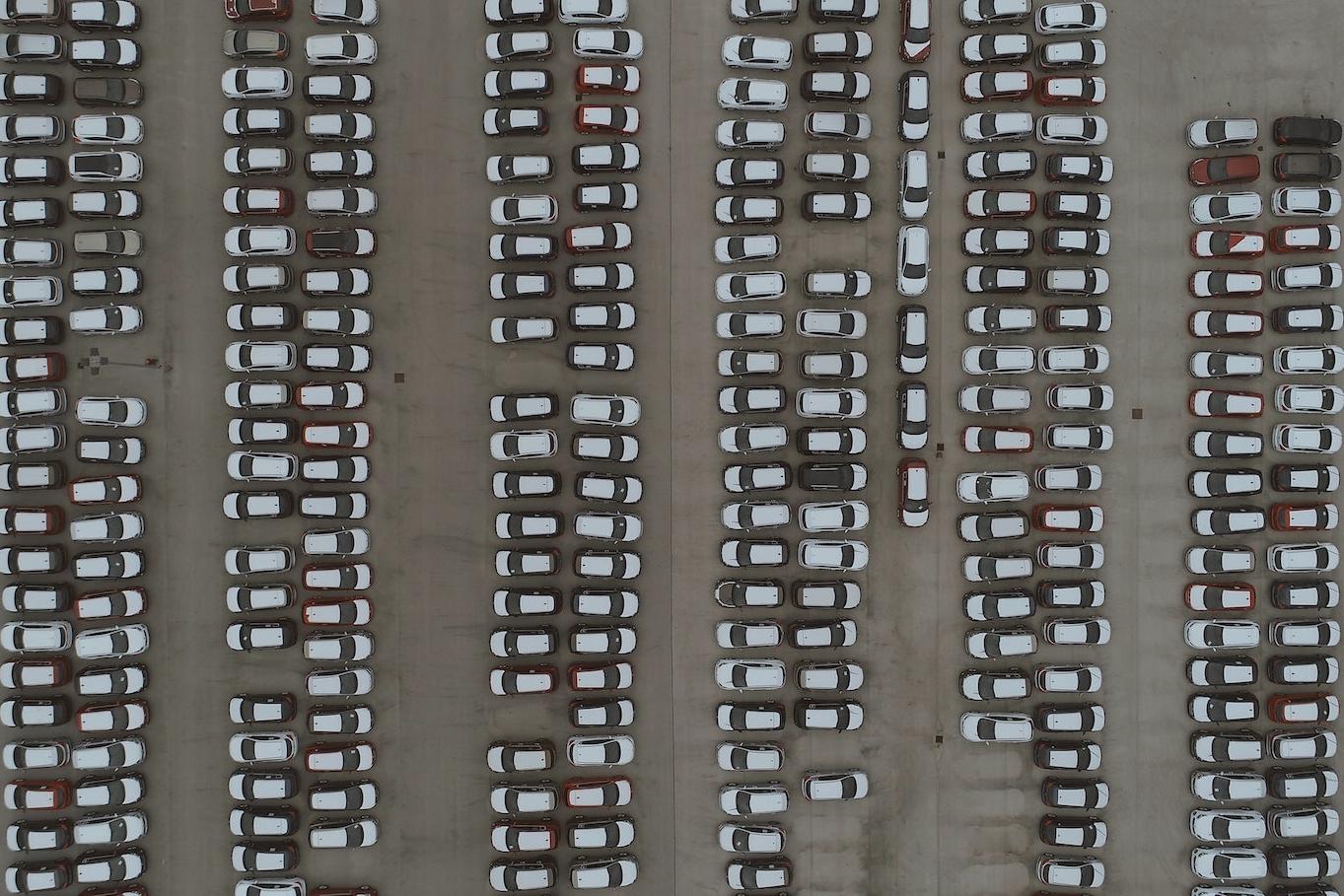 aerial view of parking lot - cars EVs