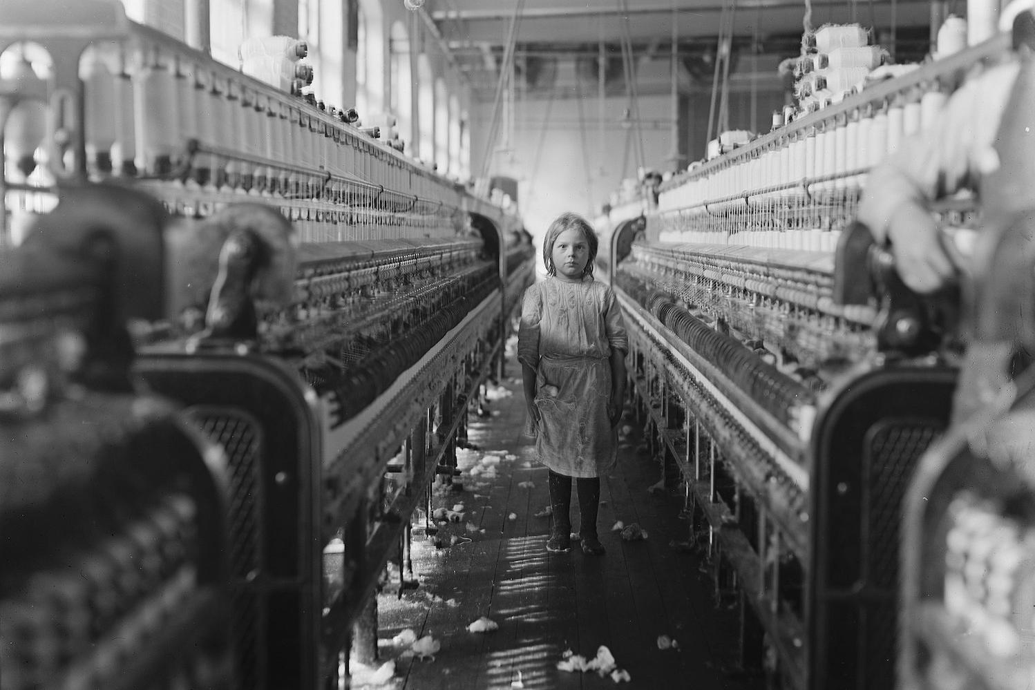 child labor in the early 20th century - little girl working in a mill