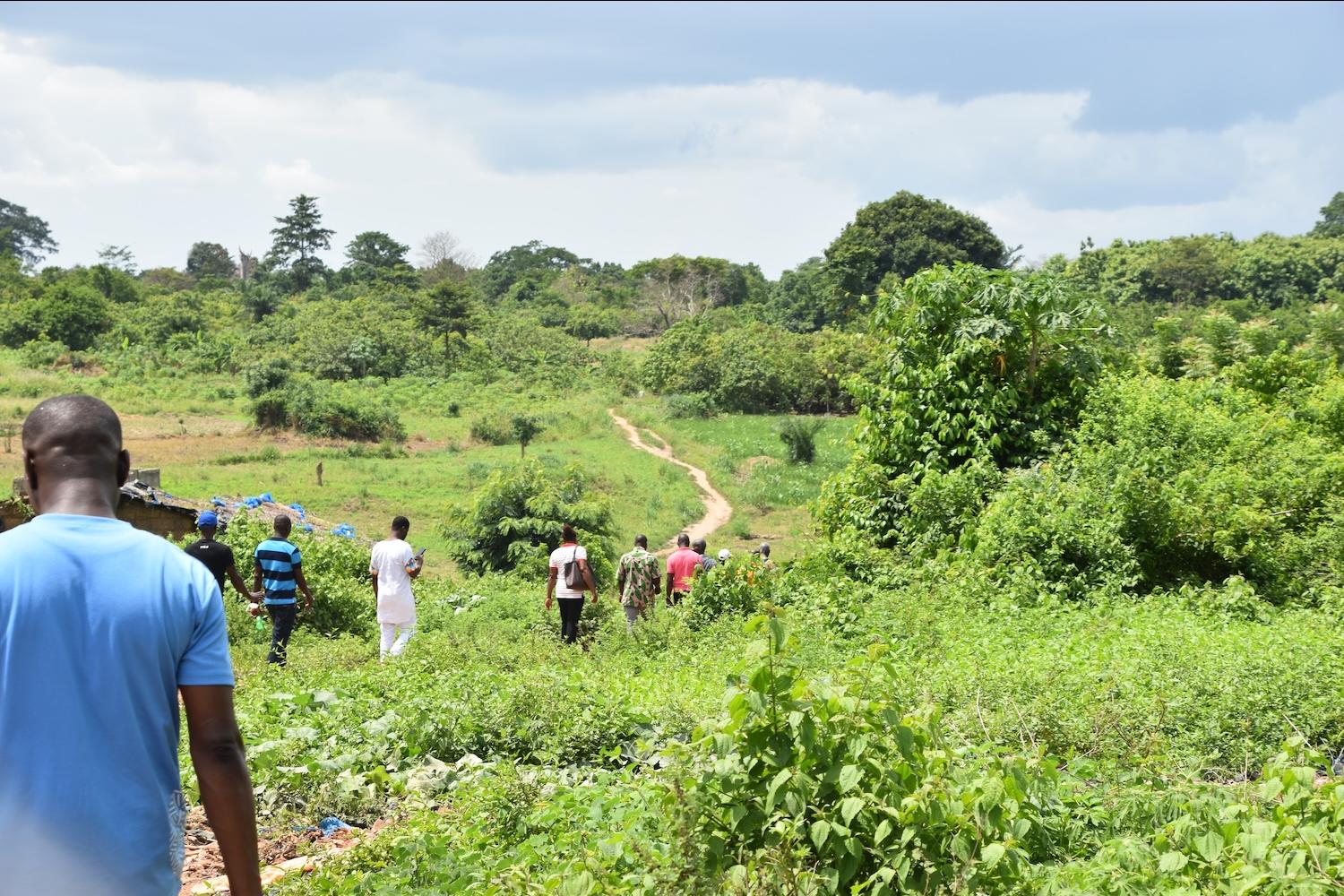 cocoa farmers on their farm — how farmers are coping with climate change