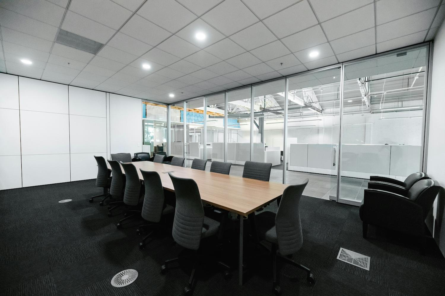 An empty boardroom table — CSR