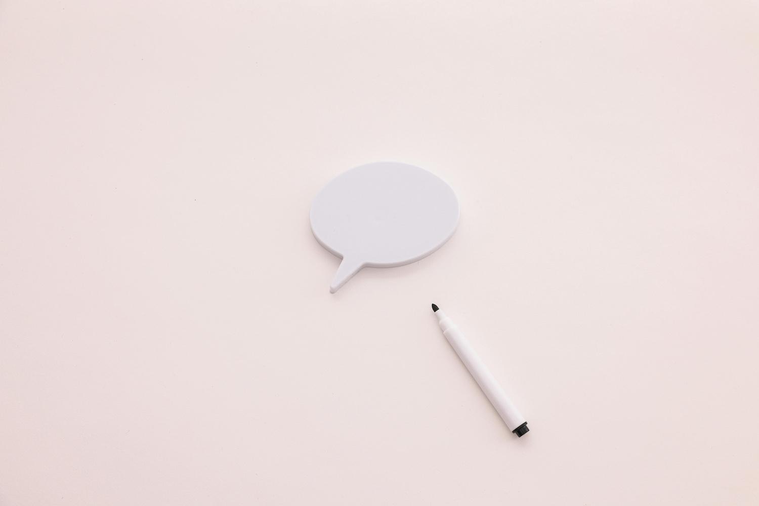A speech bubble and a marker — greenwashing
