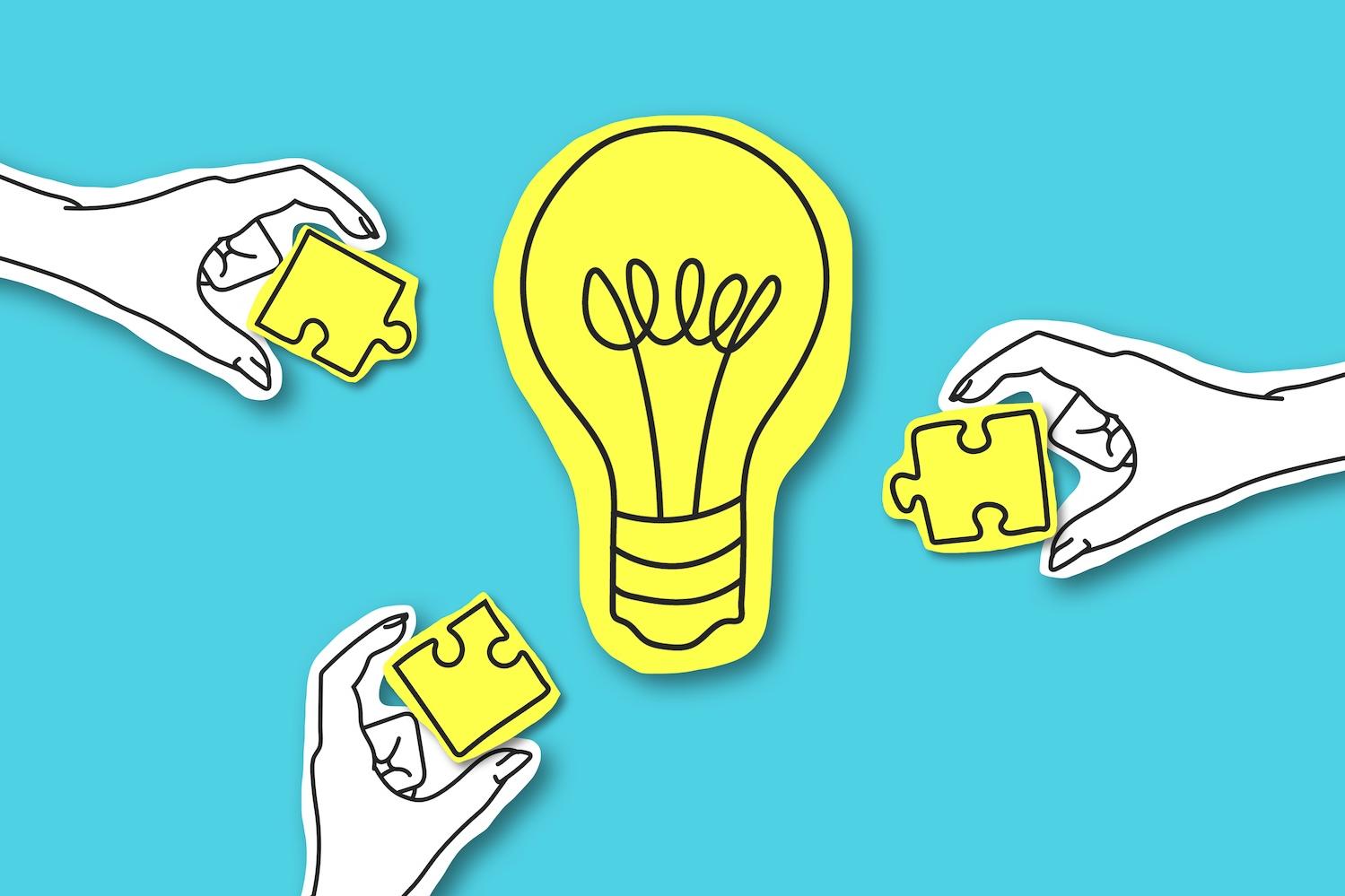 hands reaching toward a light bulb — people coming together to create ideas — employee collaboration — employees 