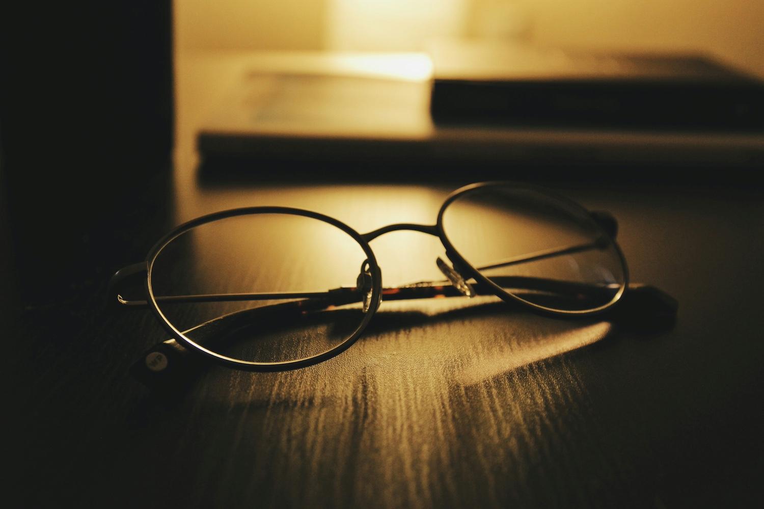 Reading glasses on a table — VisionSpring