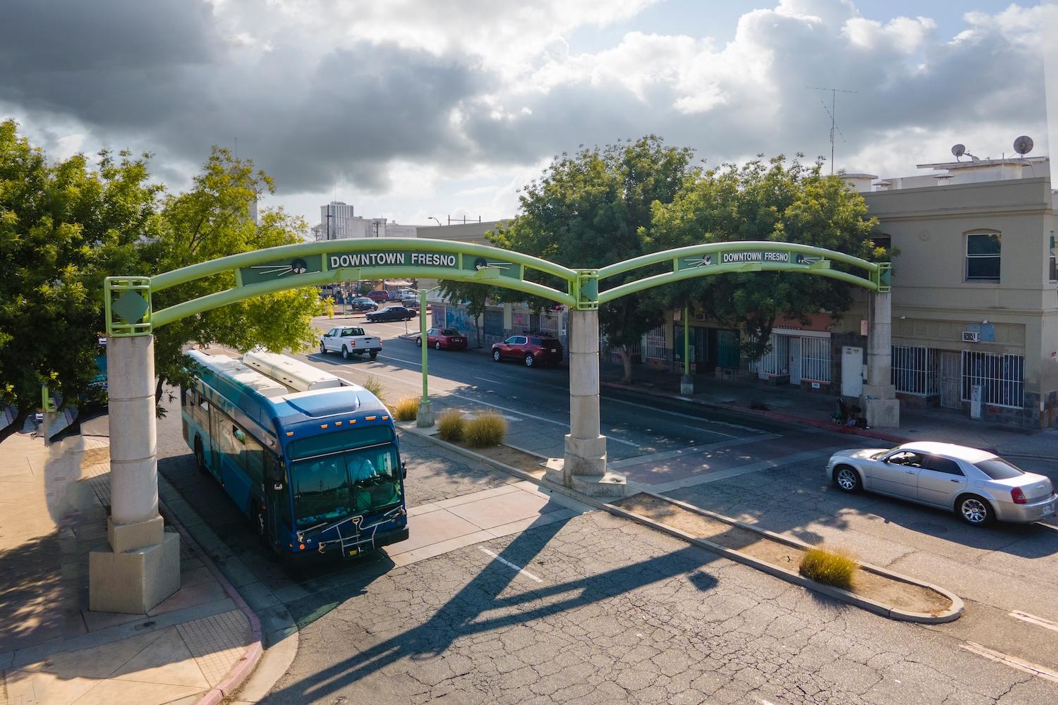 street with bus and cars in downtown fresno california — fresno is among the cities getting funding through the greenhouse gas reduction fund and inflation reduction act