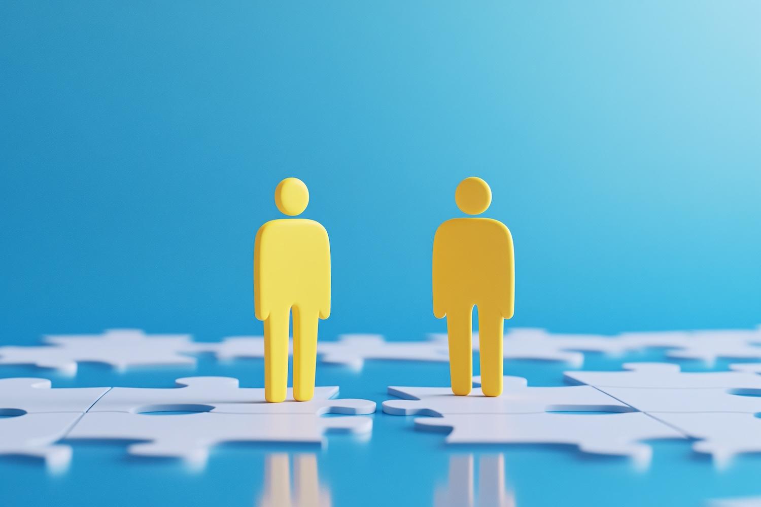 yellow figures on puzzle pieces illustration — represents CEO business leadership
