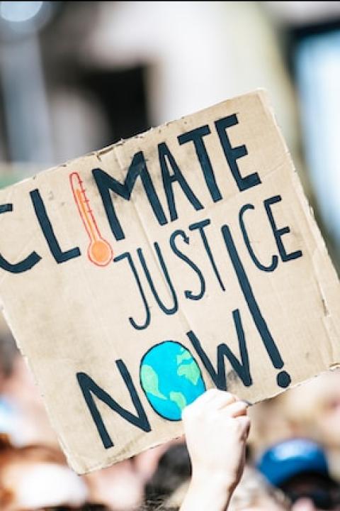 climate justice now sign