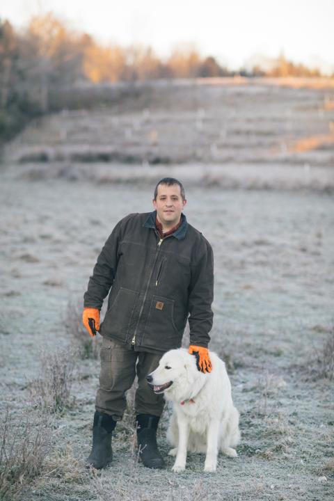 farmer morgan gold and his dog - - farmers do crowdfunding after flooding in Vermont