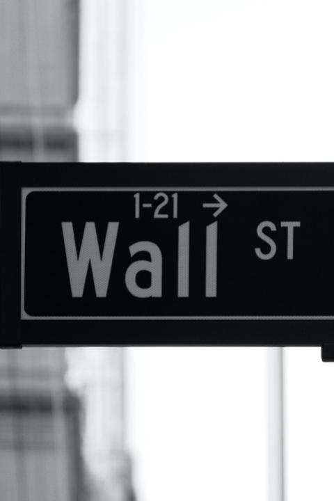 wall street sign - new york stock exchange - anti-esg policies threaten ESG investing