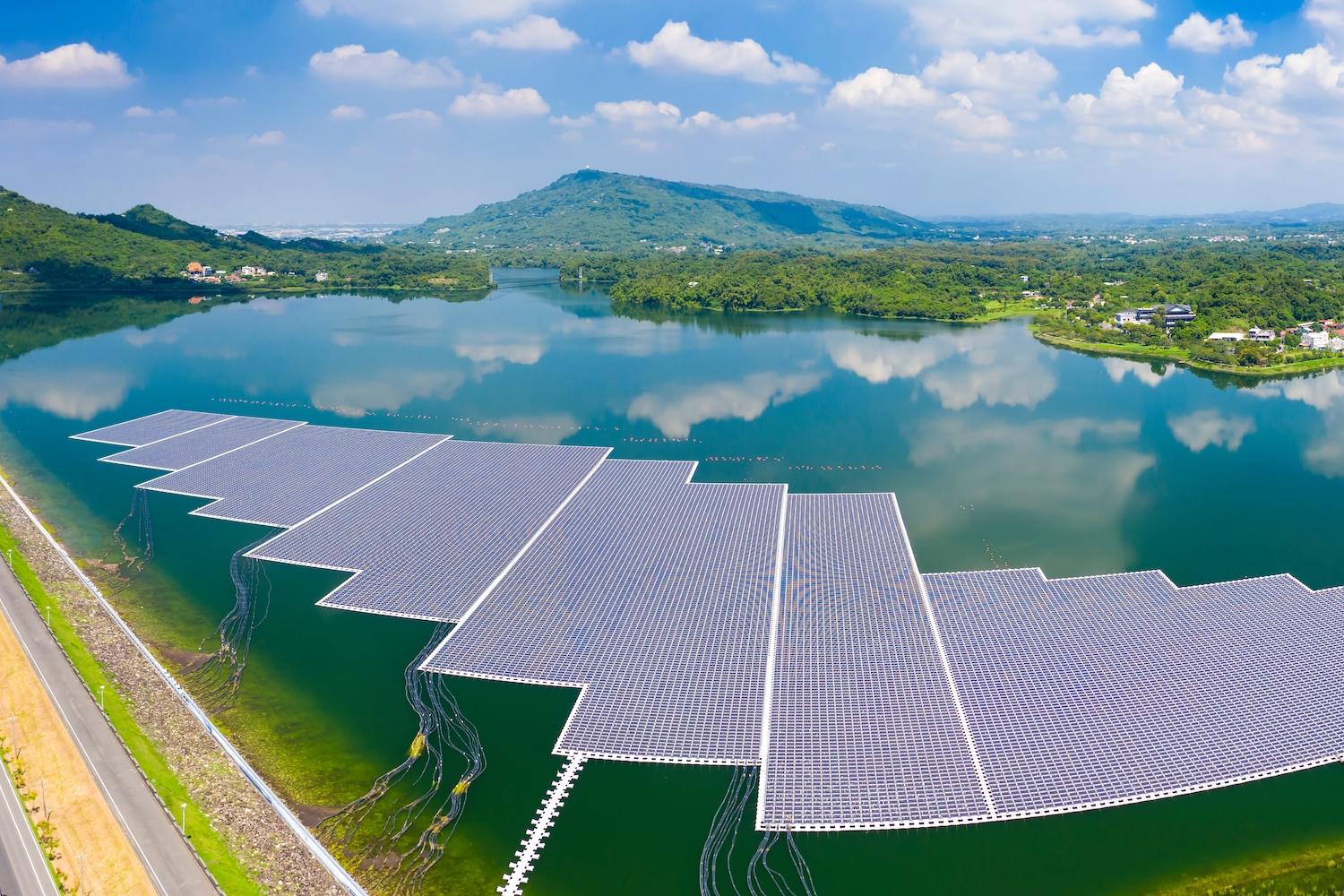 Floating solar farm on a lake in the mountains - environmental solutions